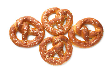 Tasty pretzels with salt isolated on white, top view