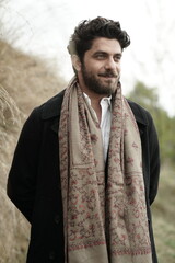 portrait of a man in a field