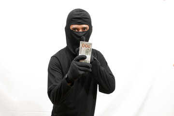 thief holding many dollar bills isolated on white background