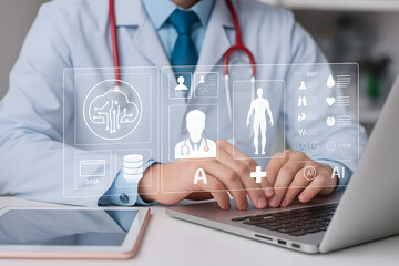 Medical Professional with Digital Interface: An adept medical professional, clad in a crisp white coat, navigates an advanced digital interface on a laptop.