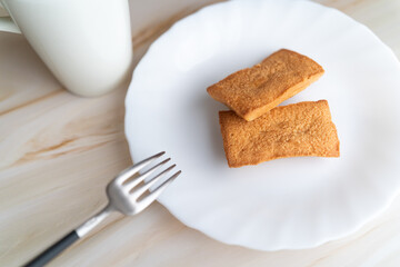 Financier and White Mug on Plate⑦