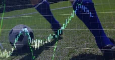 Male athlete tapping ball and dribbling forward on grass field, animating market candlestick charts - Powered by Adobe