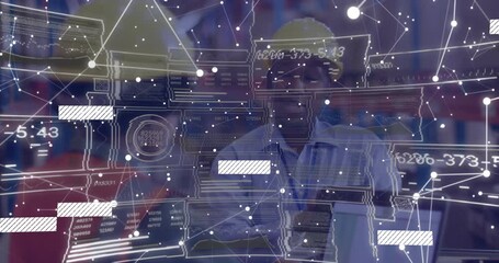 Factory workers tapping tablet and analyzing data with animated overlay materializing over line - Powered by Adobe