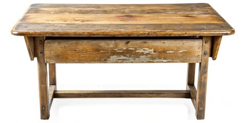 Weathered wooden school desk with a scratched surface, showing signs of aging and wear and tear
