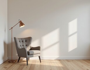 A cozy gray armchair sits next to a copper floor lamp in a minimalist room with warm natural light casting window shadows on the wall.