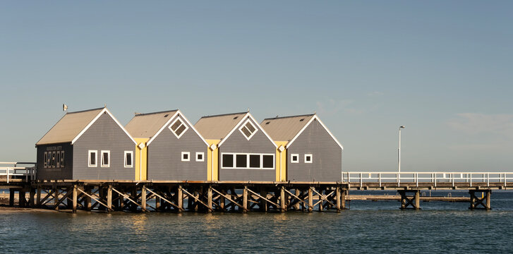 Busselton Jetty in Western Australia with tourist buildings and a long pier.