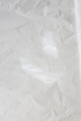 old crumbled paper with lights and shadows, texture background