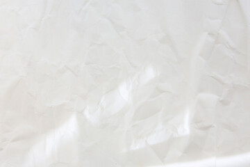 old crumbled paper with lights and shadows, texture background