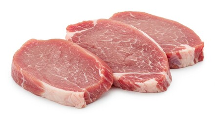 Fresh raw pork chops arranged neatly on a white background, ideal for culinary presentations