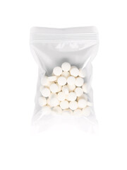 A transparent white plastic bag containing medicine from a hospital with white pills inside. On an isolated transparent background,