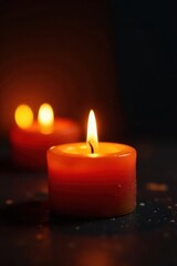 Warm candlelight glow, flickering flames on dark background, candles, shadows, image