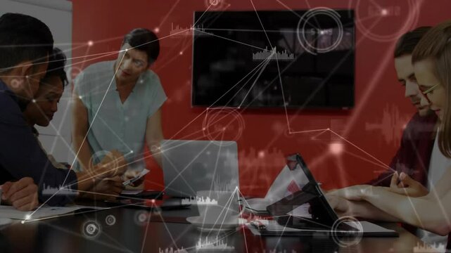 Midcareer man showing phone to team in business meeting, overlay linking devices integrating work