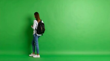 Young woman posing confidently against a bright green screen for creative photography projects - Powered by Adobe