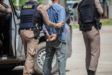 "Police Catch the Culprit",Police steel handcuffs,Police arrested,Professional police officer has to be very strong,Officer Arresting.