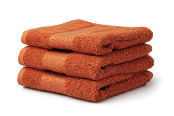 Four neatly folded orange towels, white background — soft, clean, vibrant, linen, bathroom, textile, bright, cozy.