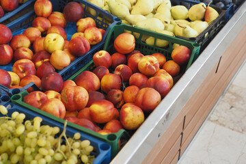 Fresh fruits displayed in market baskets for sale
