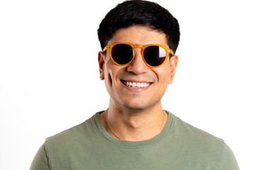 Face of young man looking at the camera with sunglasses