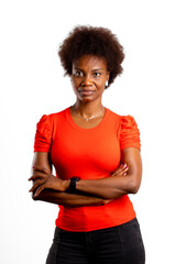 Young black woman with posture and judging look, poses with arms crossed on white background
