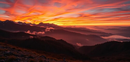 Fiery sunset paints misty mountain peaks, valley shrouded in twilight, hill, range