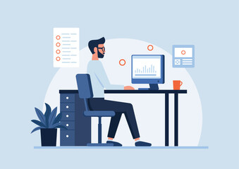 Office worker analyzing data on computer at desk.