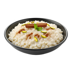 Creamy rice pudding recipe with cinnamon and pistachio garnish in a black bowl on dark background on transparent background