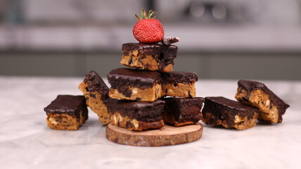 Choco Chip Cookie Brownies are decadent brownie-cookie hybrids featuring a chewy brownie layer...