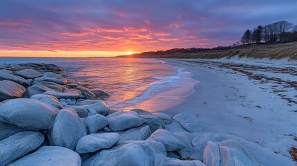 Coastal sunset over a tranquil beach