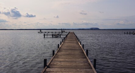 long wooden walkway with a view of Lake Steinhude