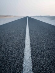 A straight road in the middle of magnificent sand dunes, dramatic photo, simple line drawing, symmetrical composition, at dusk, master of landscape photography, film emulsion fading effect