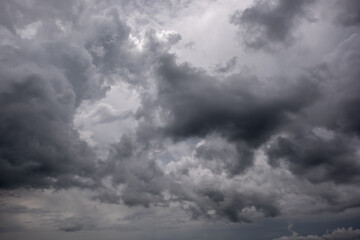 Obraz premium Dark sky with stormy clouds. Dramatic sky rain,Dark clouds before a thunder-storm,clouds before rain