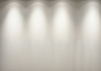 Obraz premium Textured wall features downward lighting showing a spotlight effect perfect for presentations or backgrounds