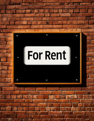 for rent sign on brick wall
