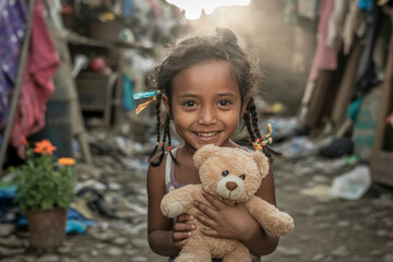 a little girl holding a teddy bear in a dirty street
