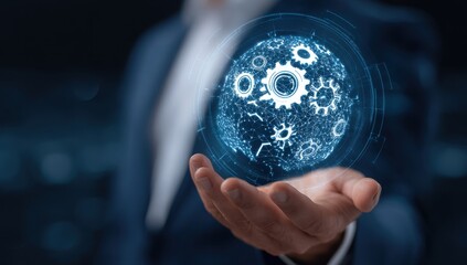 Businessman holds glowing globe of gears