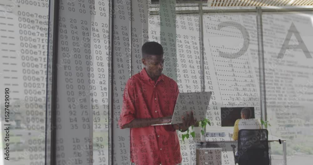 Poster software developer typing on laptop by window and animating code overlay across glass partition
