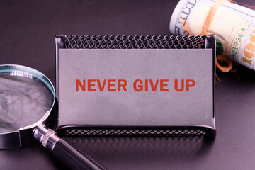 Business development challenge concept and effort success idea. Never give up written close-up on a...