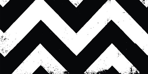 Fototapeta premium A black and white chevron patterned background. Black and white chevron pattern texture background. Dynamic monochromatic zigzag pattern isolated on white background.