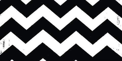 A black and white chevron patterned background. Black and white chevron pattern texture background. Dynamic monochromatic zigzag pattern isolated on white background.