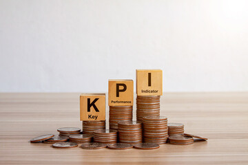 KPI concept. Wooden blocks with KPI icons,copy space. Key Performance   Indicator using business intelligence metrics connected to database. Business, finance, operations, sales, marketing performance