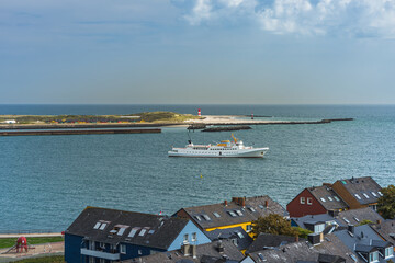High-angle view from the main island of Heligoland to the nearby dune island with lighthouse, North Sea, Schleswig-Holstein, Germany