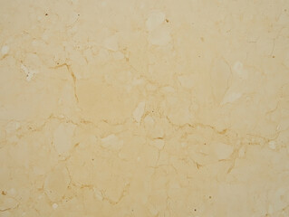 Smooth beige marble texture with subtle veining creates elegant and natural appearance, ideal for interior design and architectural projects