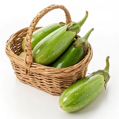 Green eggplants in a basket made of rattan and isolated on white background.