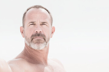 Obraz premium tamer with determined expression positioned on left side of frame hands out of view