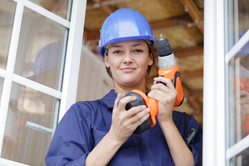 surveyor or builder looking at camera