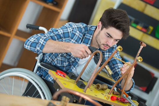 male handicapped conductor assembler