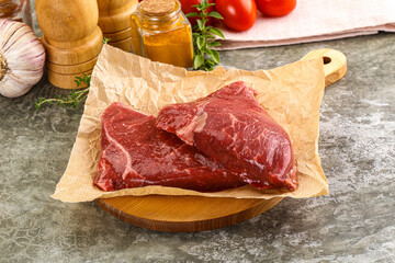 Raw marble uncooked beef steak