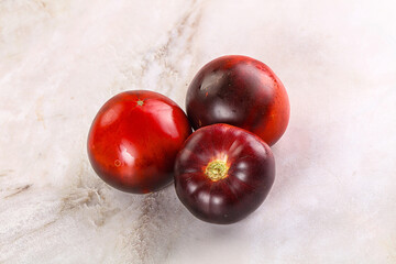 Black ripe juicy organic tomato
