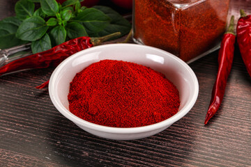 Spicy dry paprika powder in the bowl