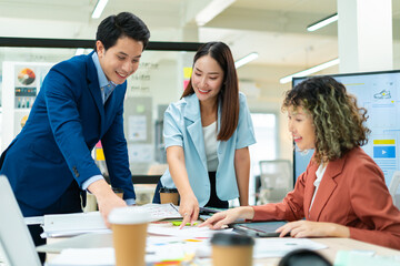 Group of creative Businesspeople brain storm meeting presentation,discussing roadmap to product launch, planning,strategy,dashboard,new business development,working with new startup project in office