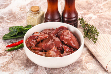 Raw uncokked chicken liver in the bowl